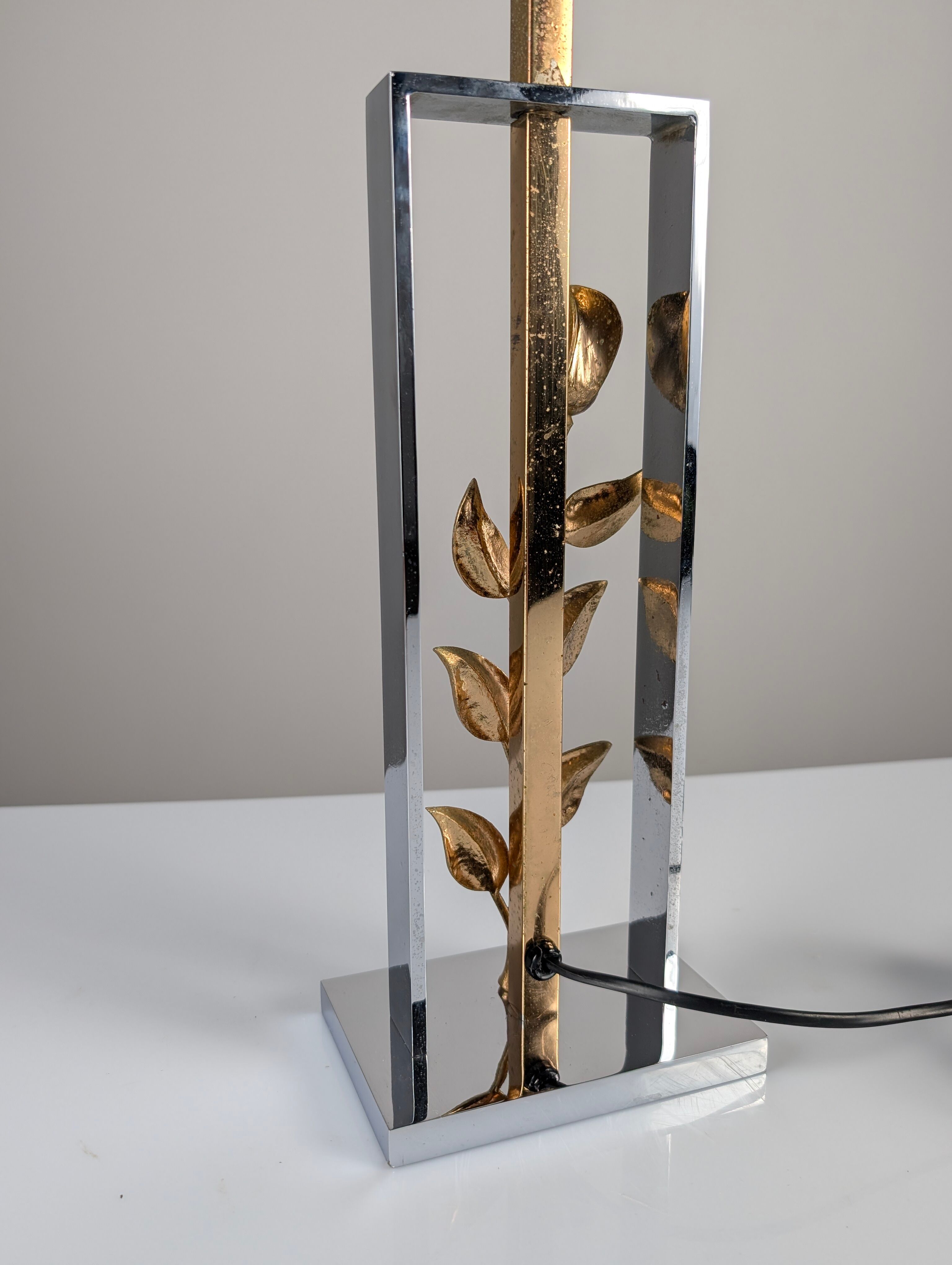 Maison Charles table lamp in chrome and gilt bronze with rose, France, 1970s