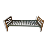 Bed with green metal braces 1960 a person foldable