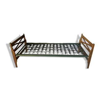 Bed with green metal braces 1960 a person foldable