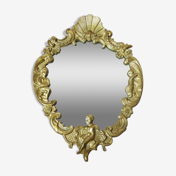 Gilt bronze mirror with angel ornament