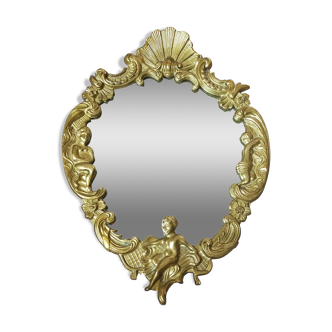 Gilt bronze mirror with angel ornament