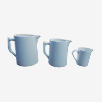 Trio of white pitchers