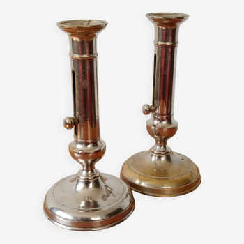 Pair of chrome-plated brass candlesticks