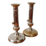 Pair of chrome-plated brass candlesticks