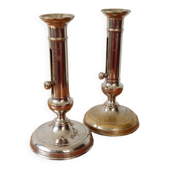 Pair of chrome-plated brass candlesticks