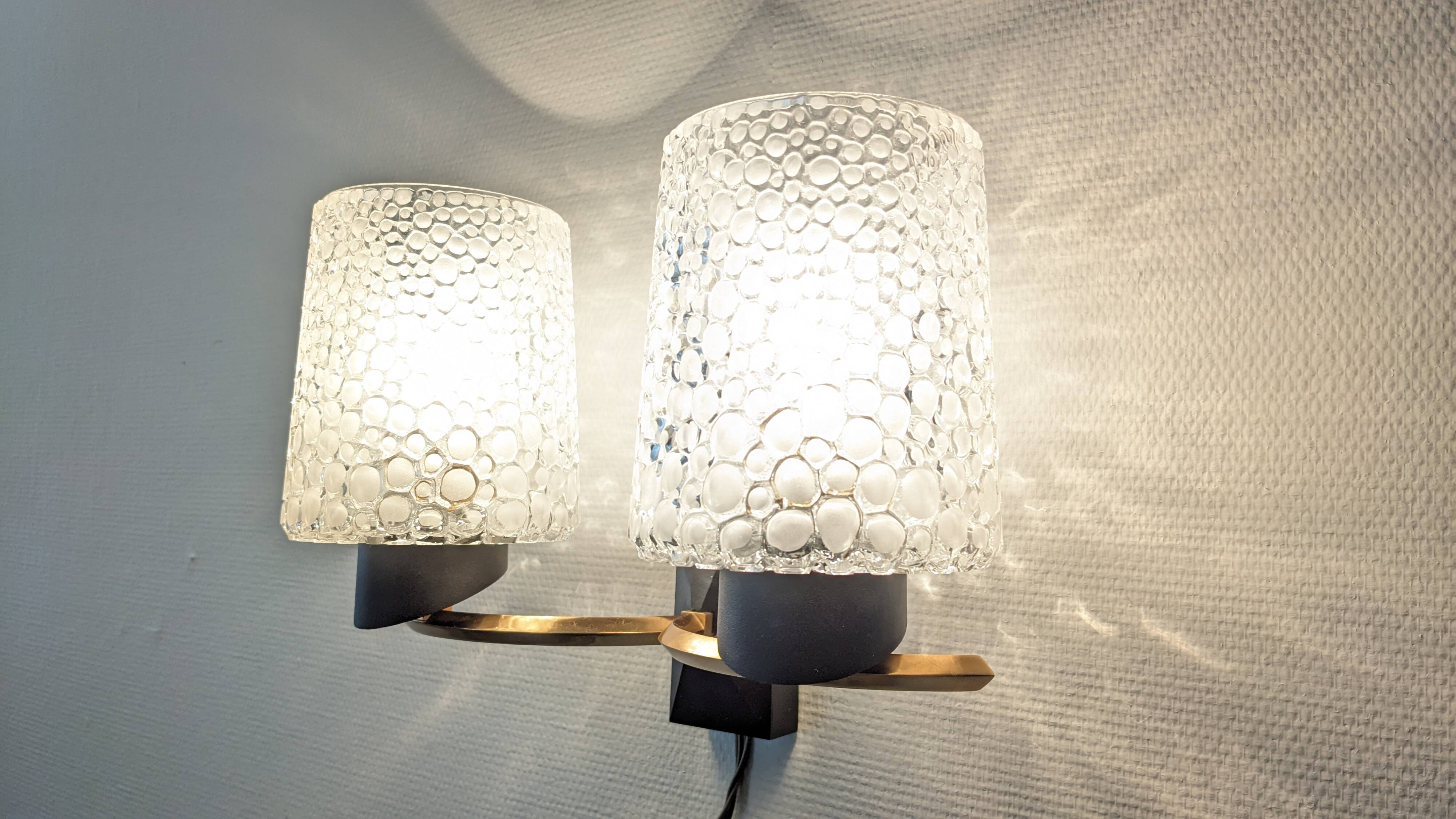 Pair of double wall lights in bubbled glass by Maison Arlus, France circa 1960.