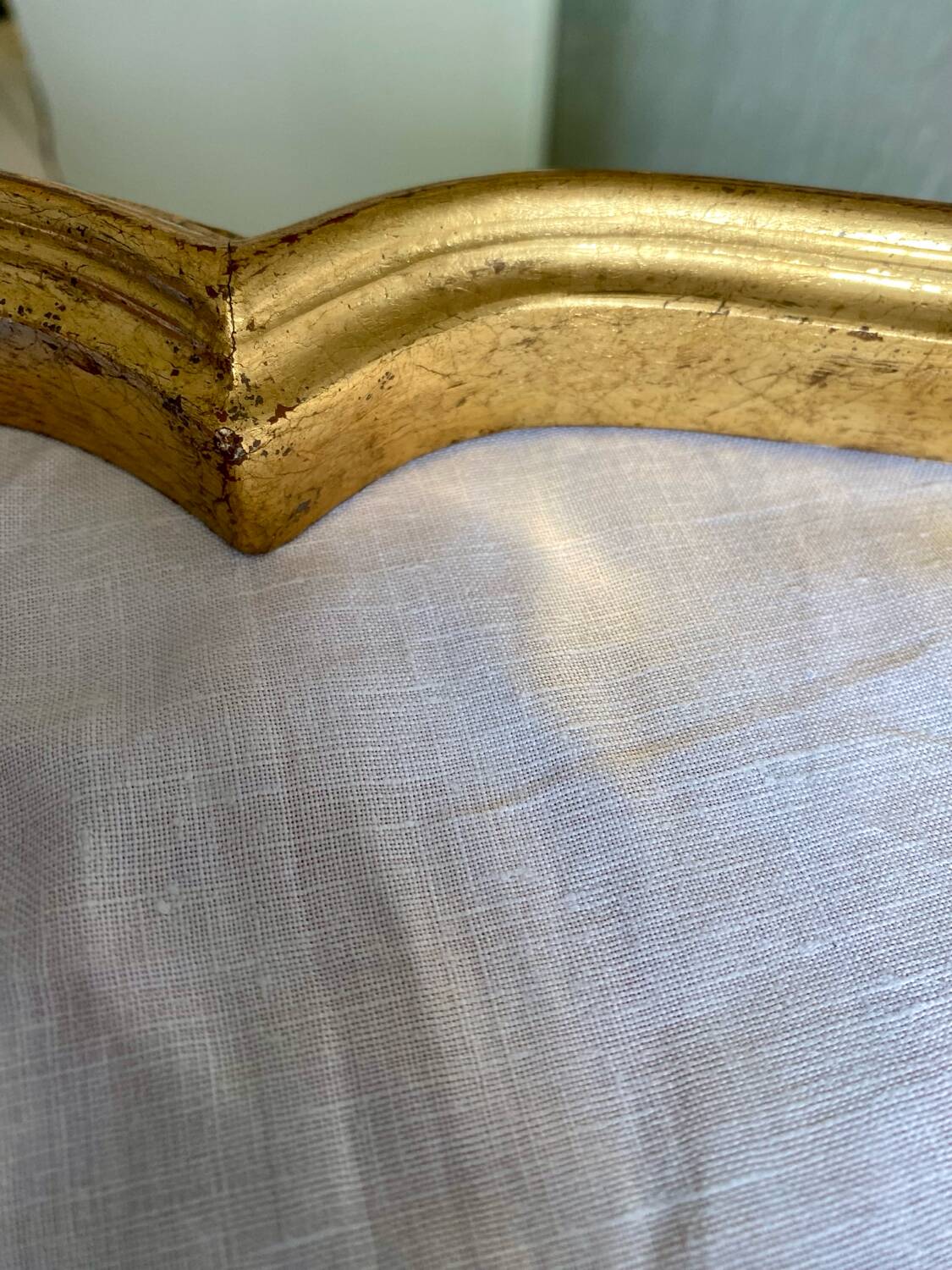 Wall mirror in a gilded wooden frame