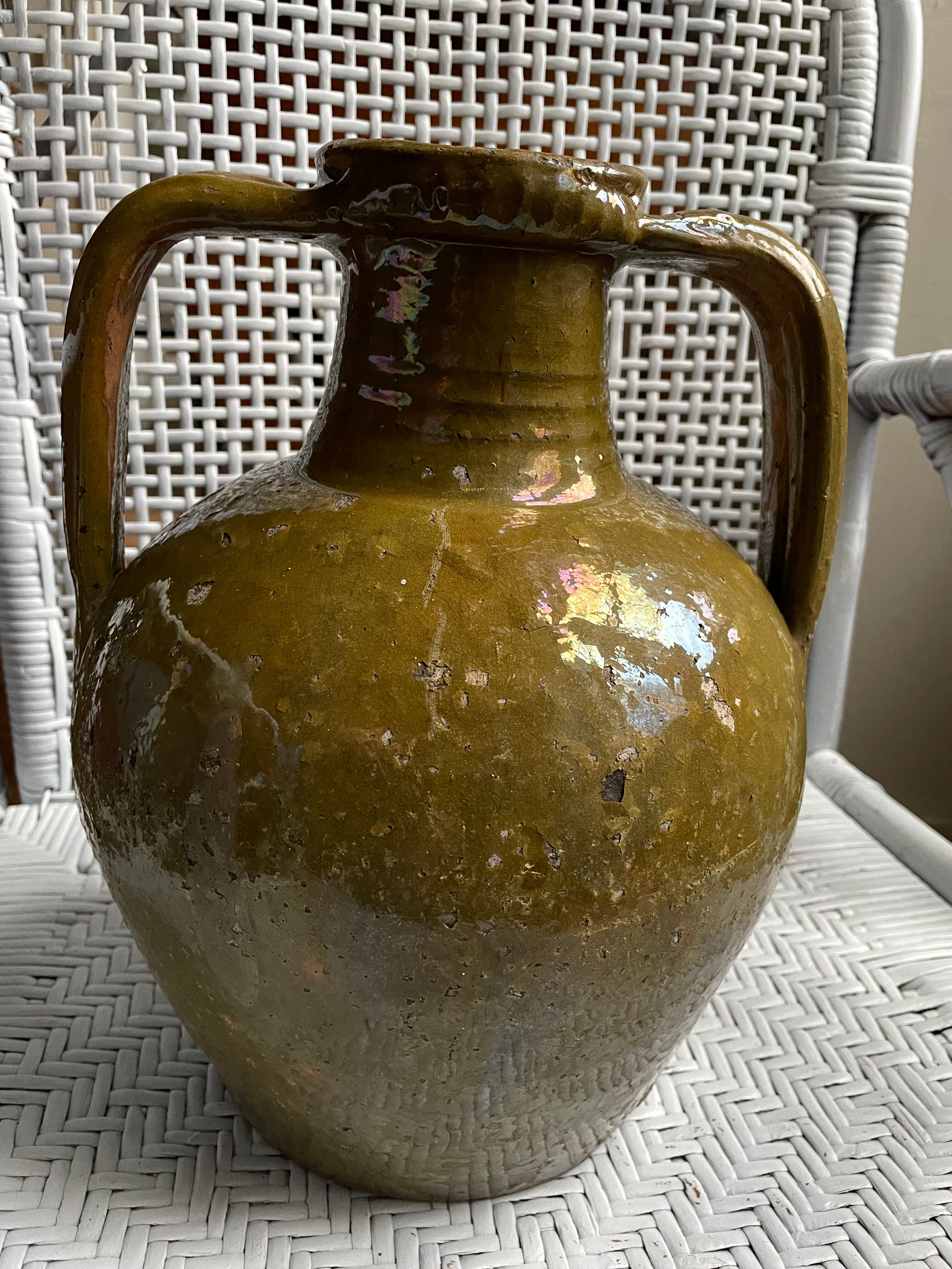 Khaki green glazed terracotta oil jar, 18th-19th century
