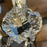 Three-light chandelier in bronze and cut crystal, early 20th century work.