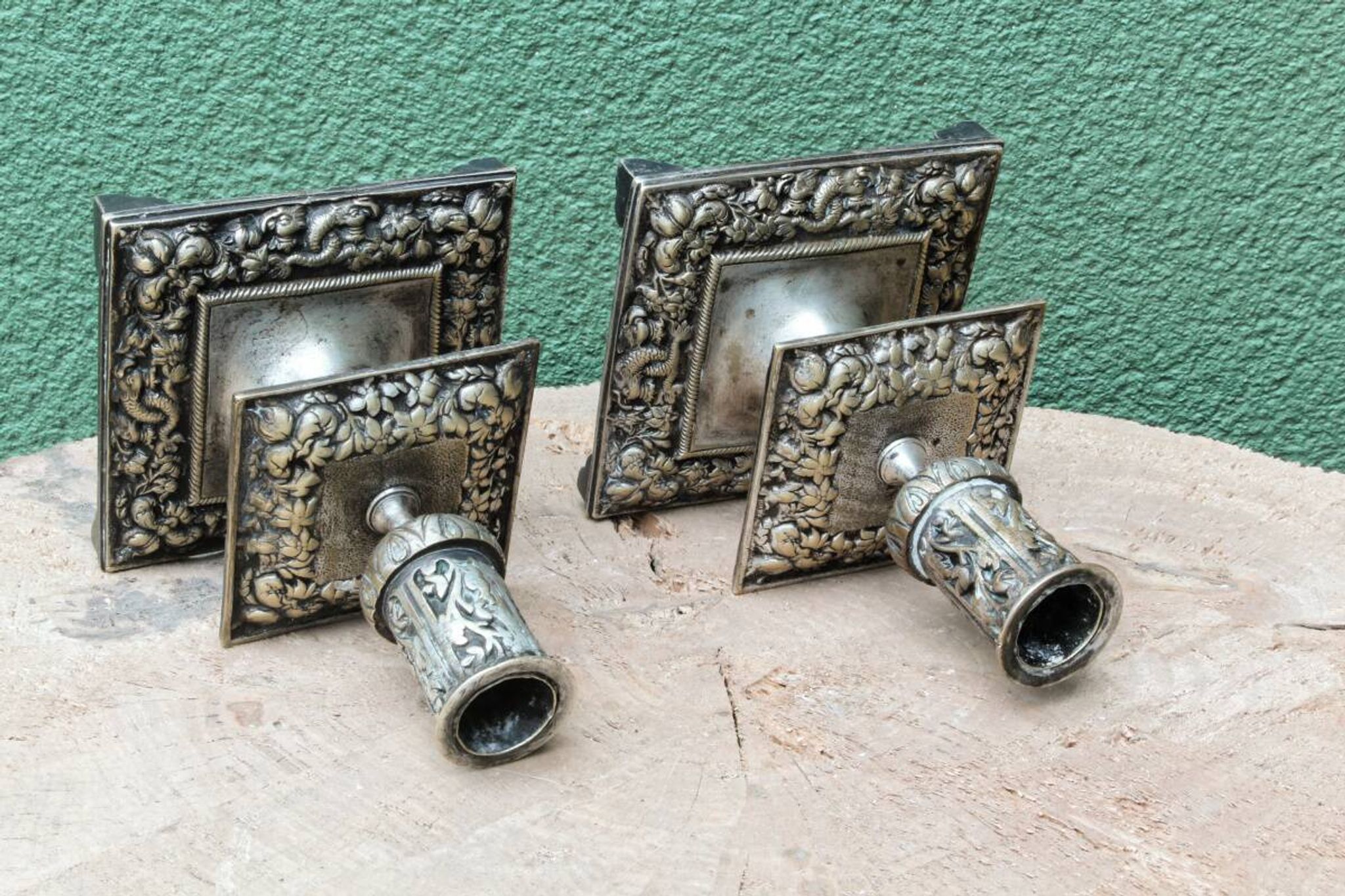 Pair of square candlesticks in patinated bronze