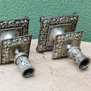 Pair of square candlesticks in patinated bronze