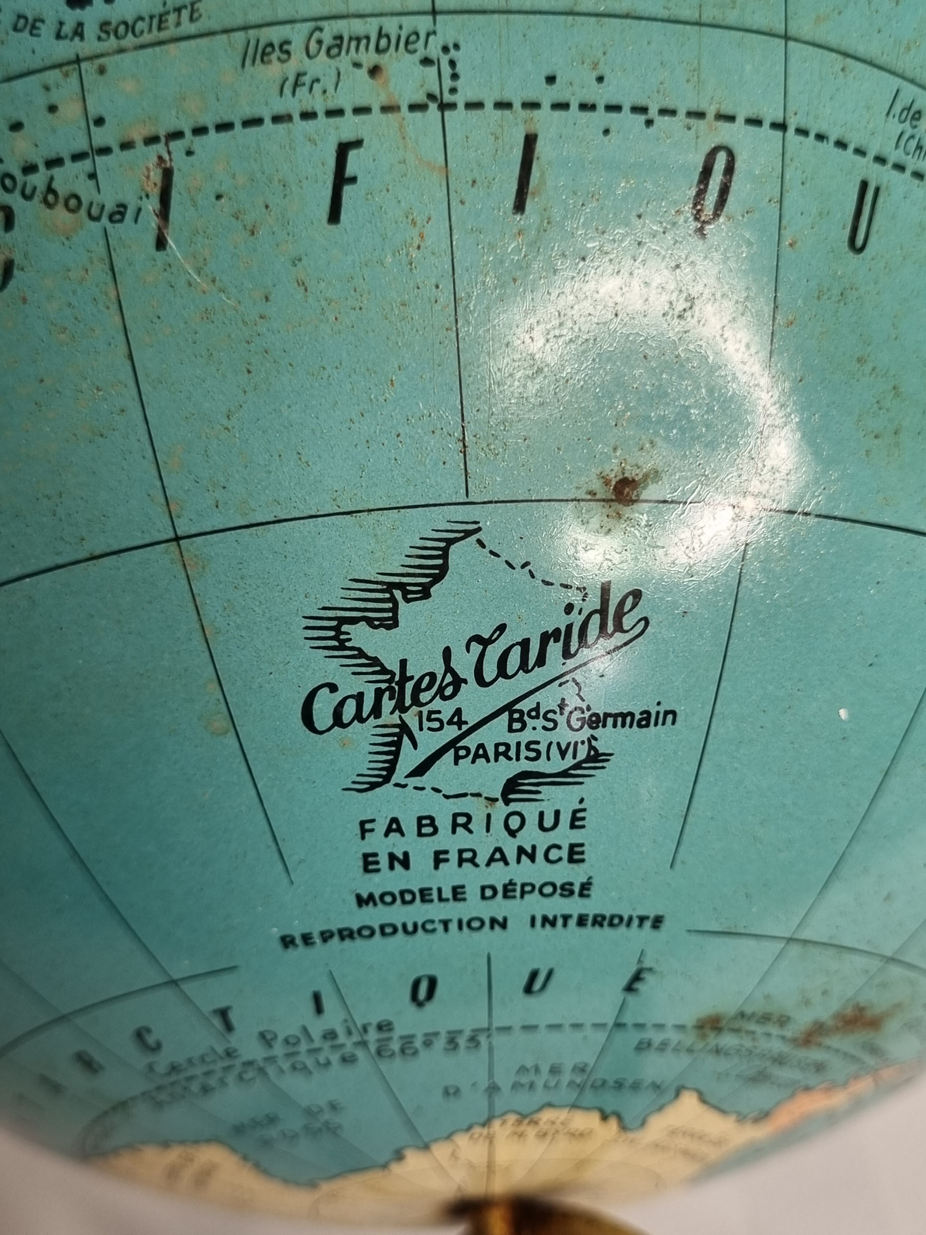 Globe earth "Taride" of the 60s in metal on tripod base, 20 cm