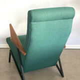Lounge or easy chair with armrests