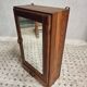 Old hanging cupboard medicine cabinet with mirror and drawer