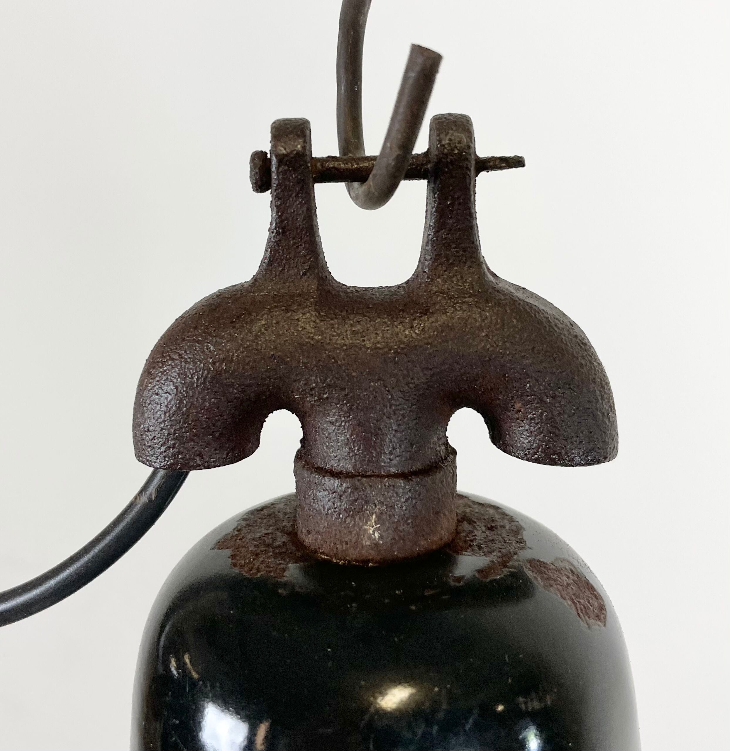 Industrial black enamel factory lamp with cast iron top, 1950s