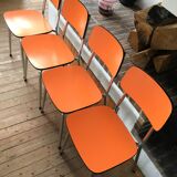 Lot of 4 vintage chairs in orange formica