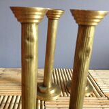 Series of 4 brass candlesticks