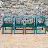 Set of 4 green folding chairs