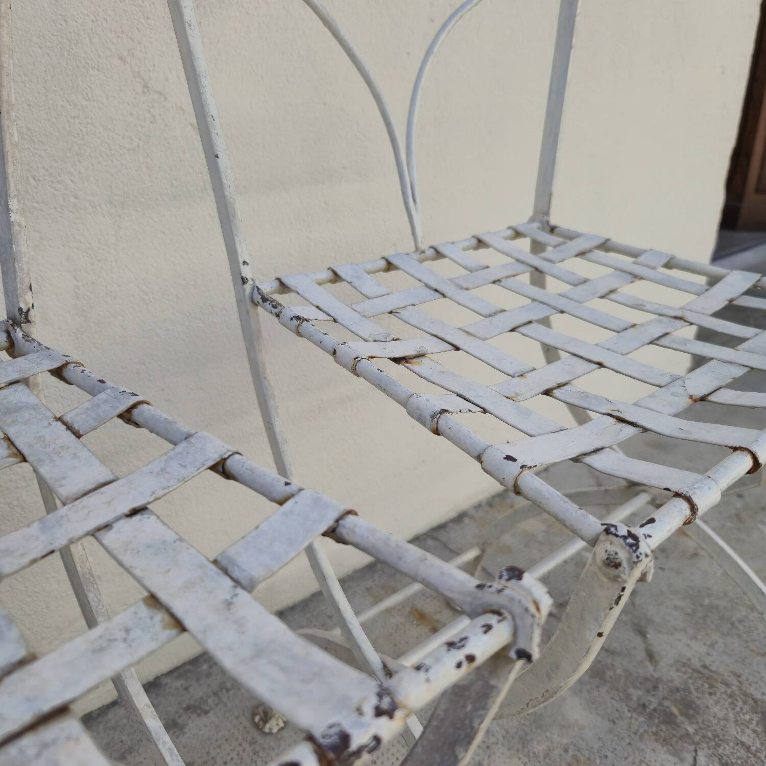 Pair of 19th century wrought iron garden chairs