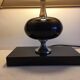 Pair of lamps, resin and chrome steel, by Philippe Barbier, circa 1970.