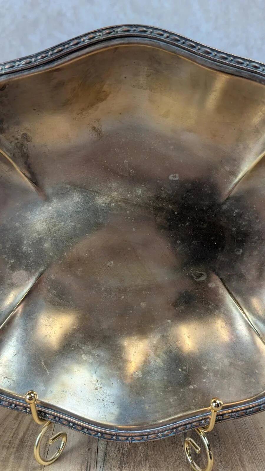 Antique oval silver-plated copper tray with handles.