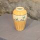 Orange and green ceramic vase with duck motif
