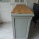 Vintage buffet on grey green wheels, 2 glass doors, wooden tray.