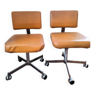 Pair of 60s industrial office chairs with skai and chrome wheels brand RM