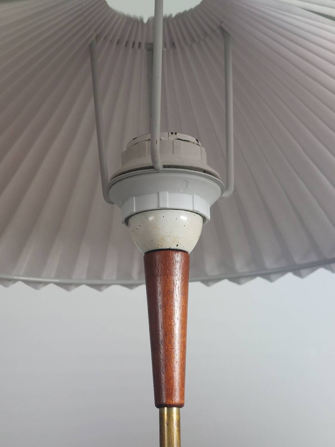 Vintage 50s wooden table lamp with pleated shade.
