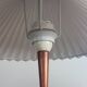 Vintage 50s wooden table lamp with pleated shade.
