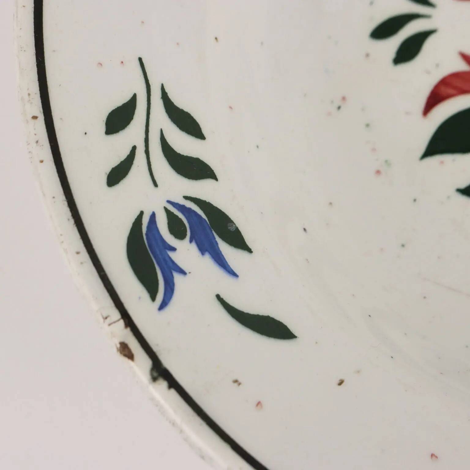 Antique ceramic plate made in France, early 20th century.