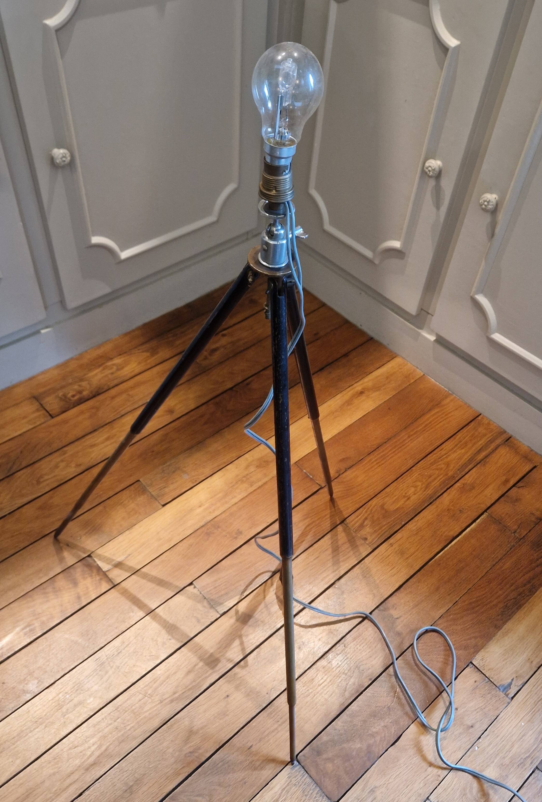 Lamp on old tripod, 1920s
