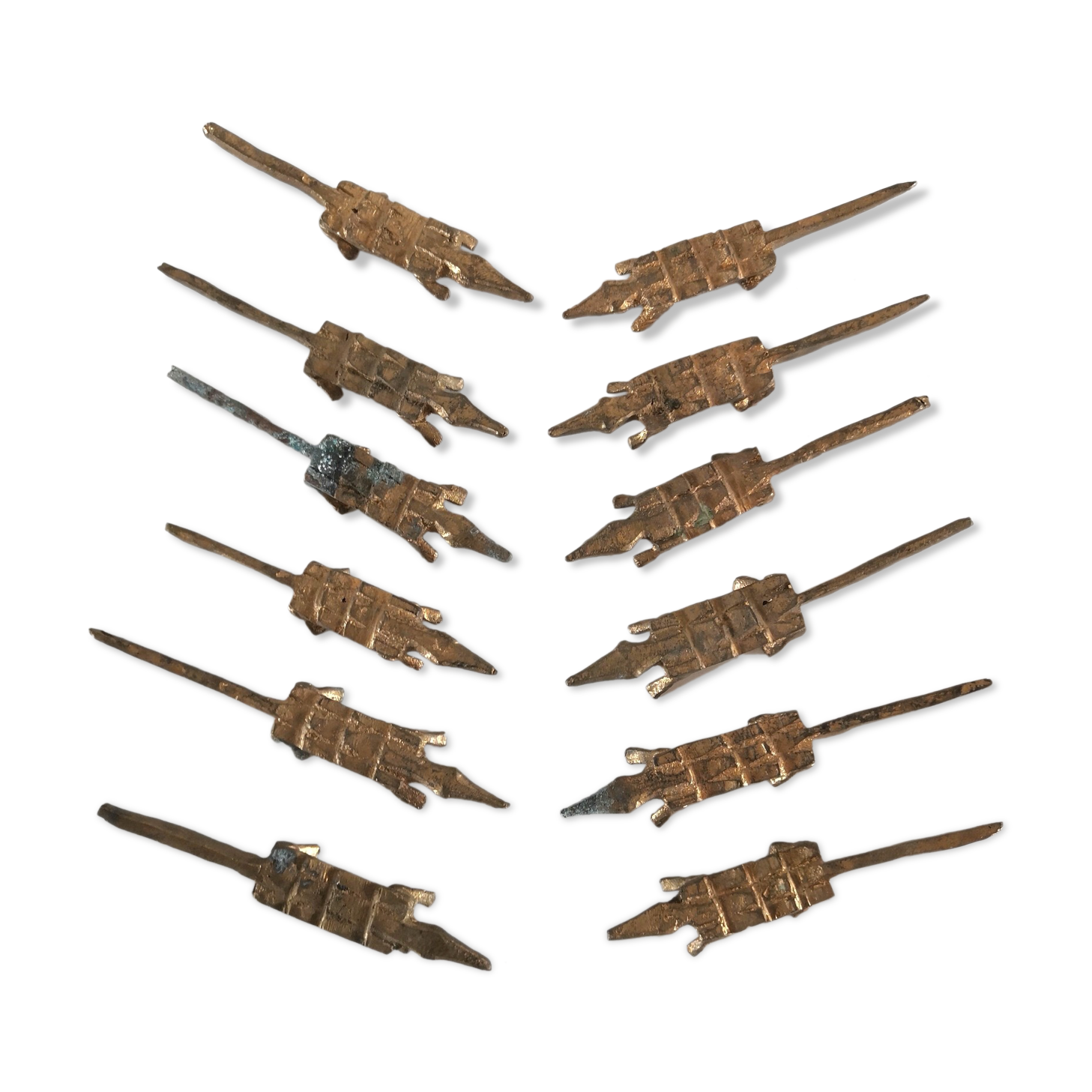 12 vintage bronze knife rests