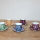 Set of 5 marbled porcelain coffee cups and saucers, hand-painted, with a gold rim.