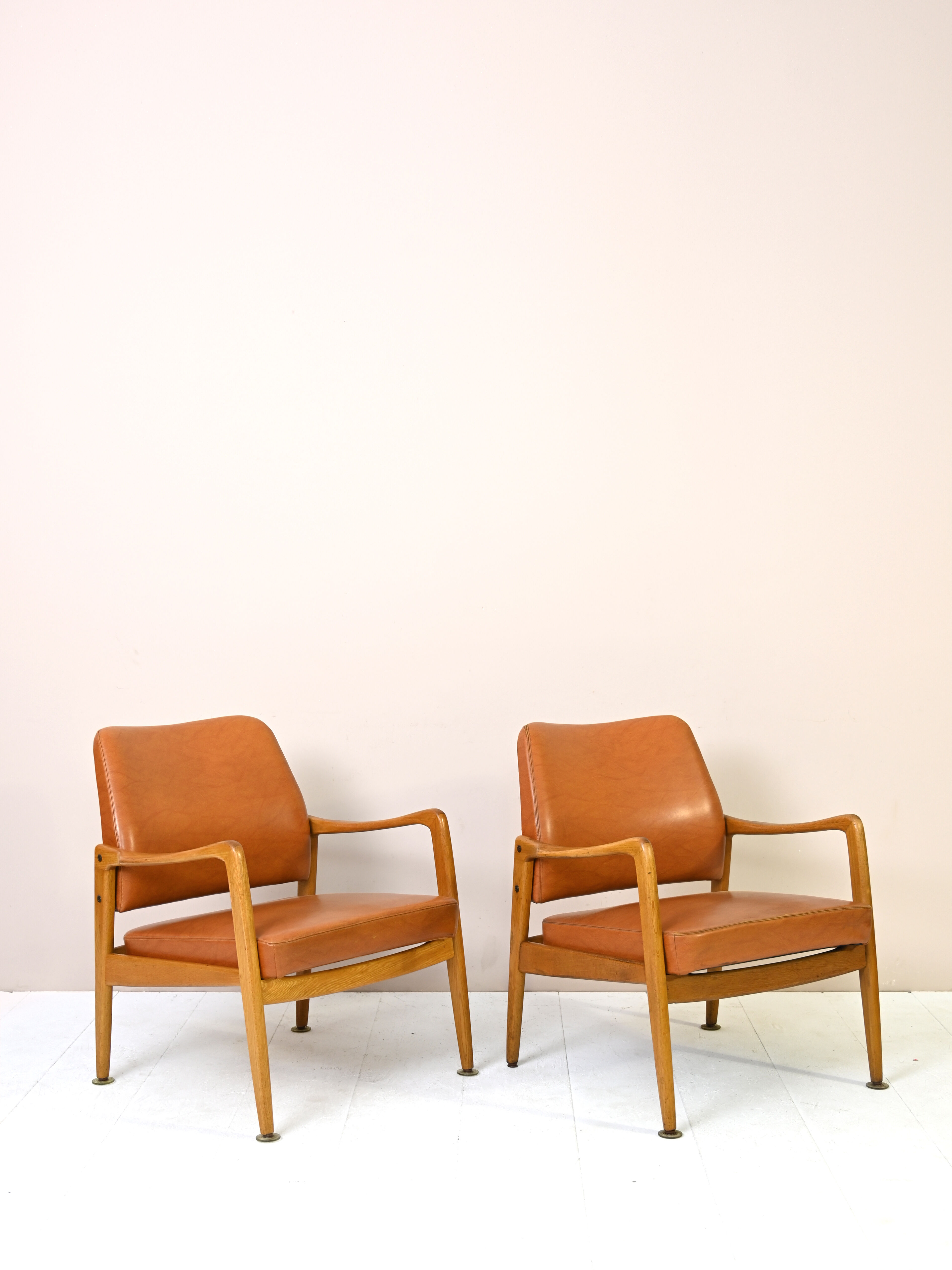 Pair of vintage Danish teak and leather armchairs