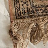 Tapis persan carré vintage