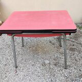 Table with two stools in red formica