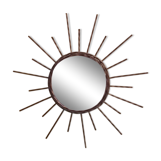 Wrought iron sun mirror.