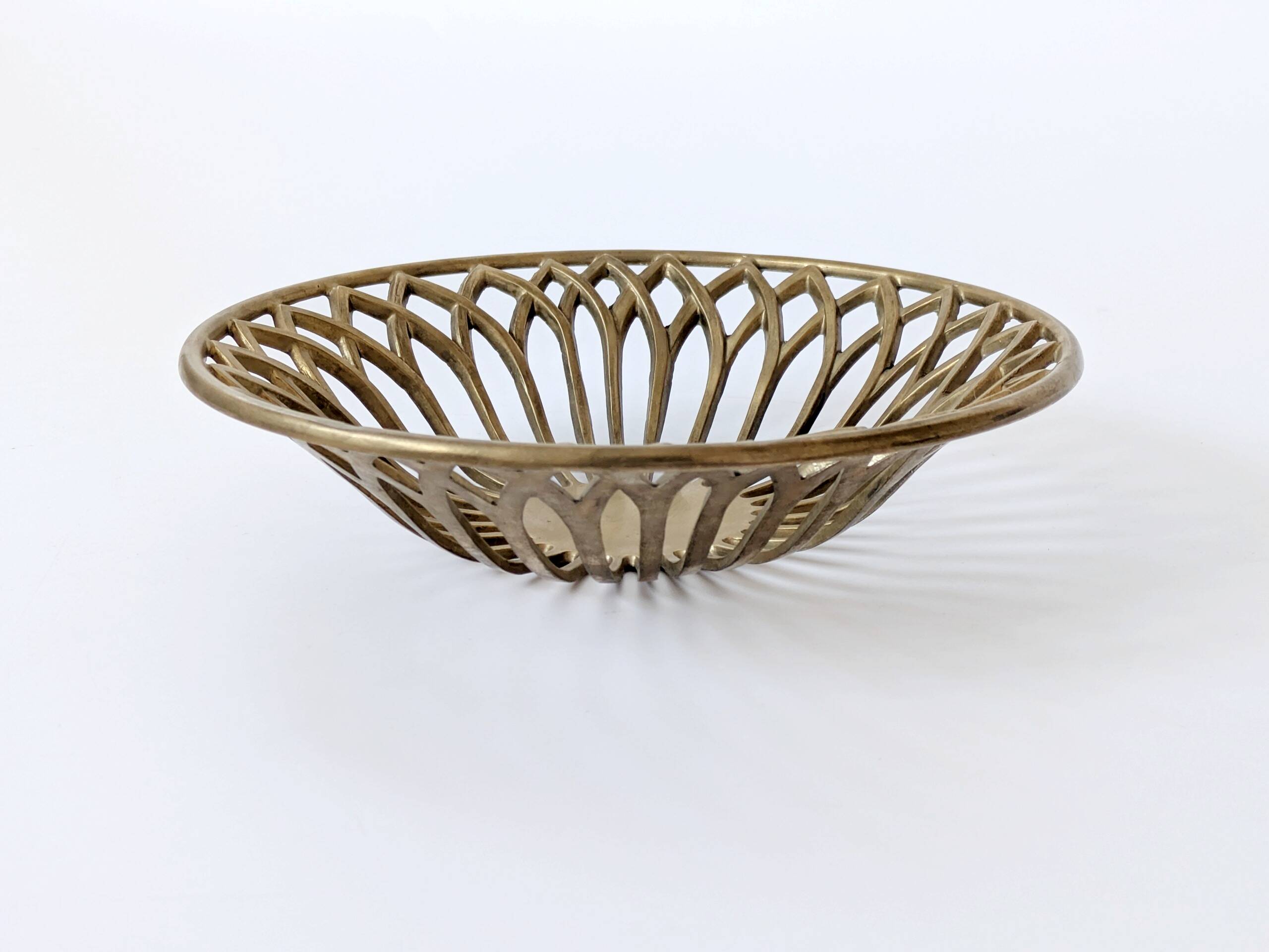 Vintage brass cut-out cup, Mid-Century design from the 1960s.