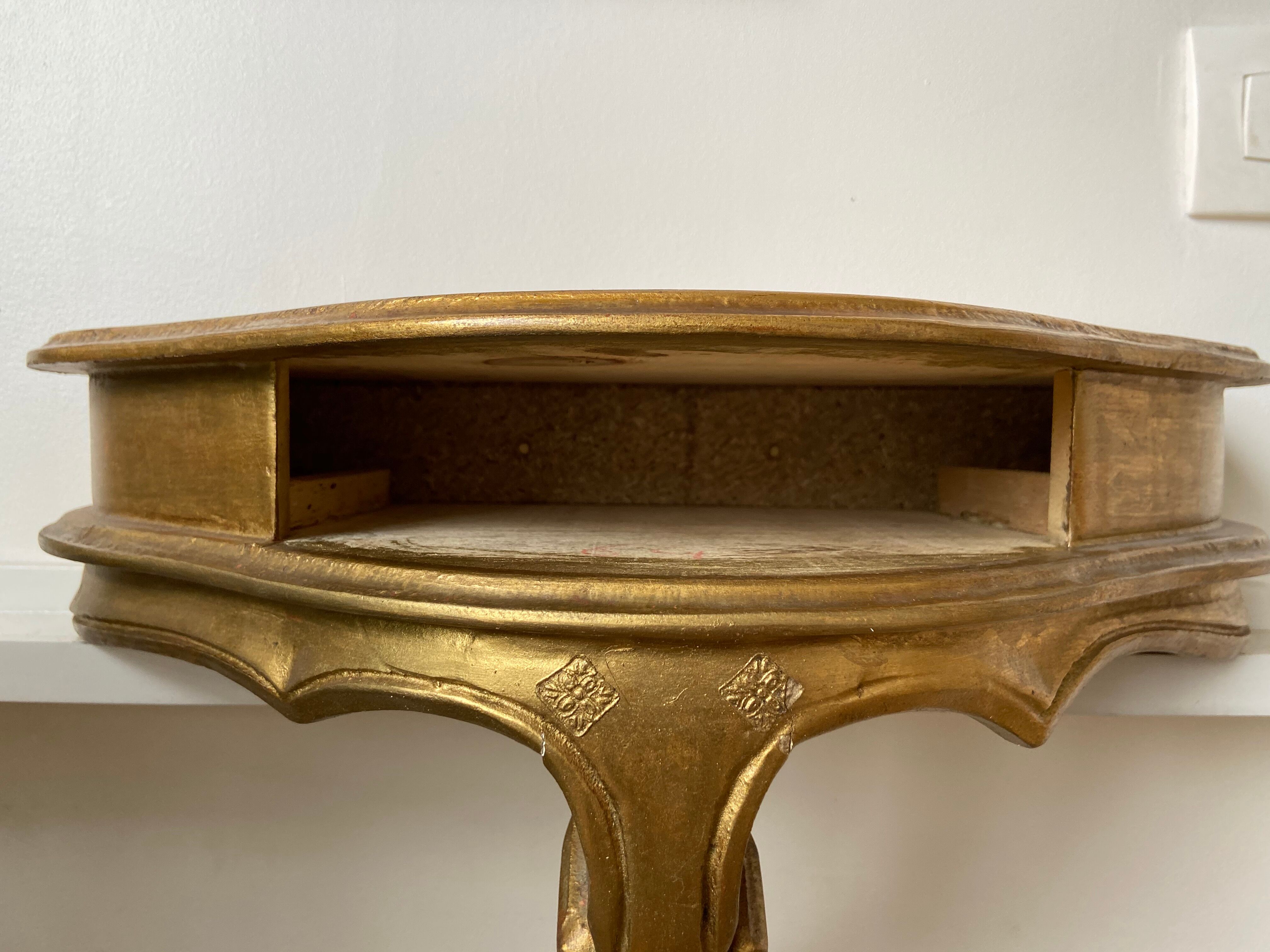 Gold wall shelf with drawer