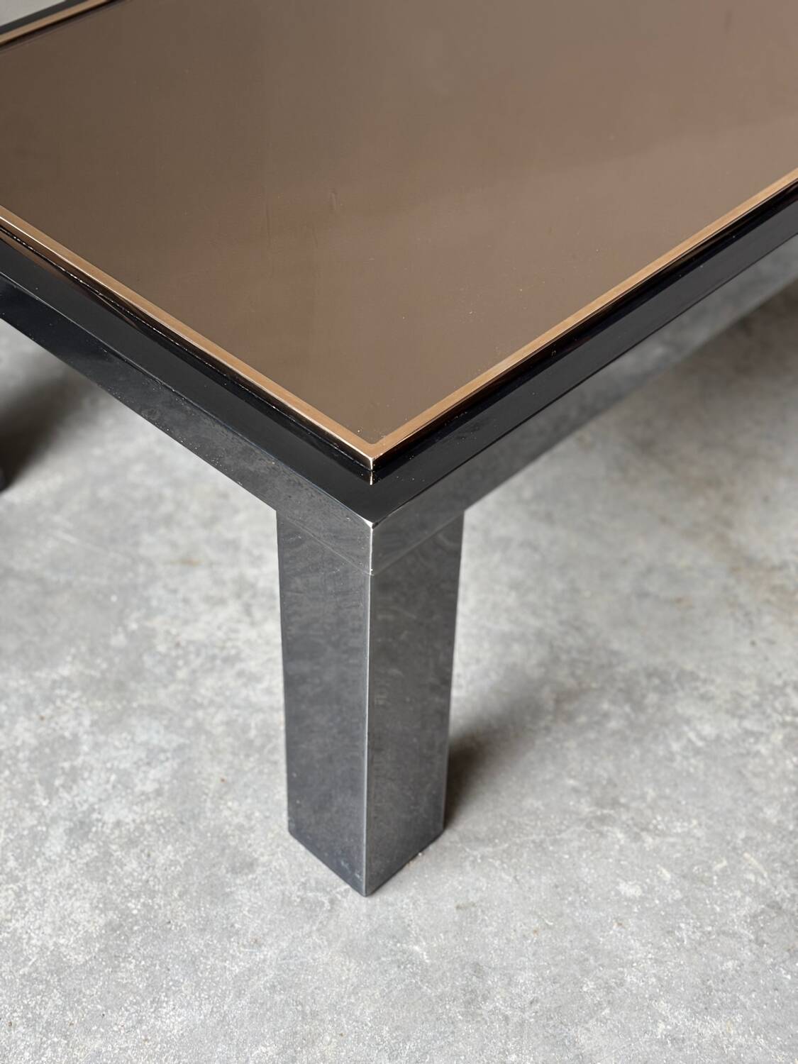 Large Belgochrom coffee table in gold and smoked glass.