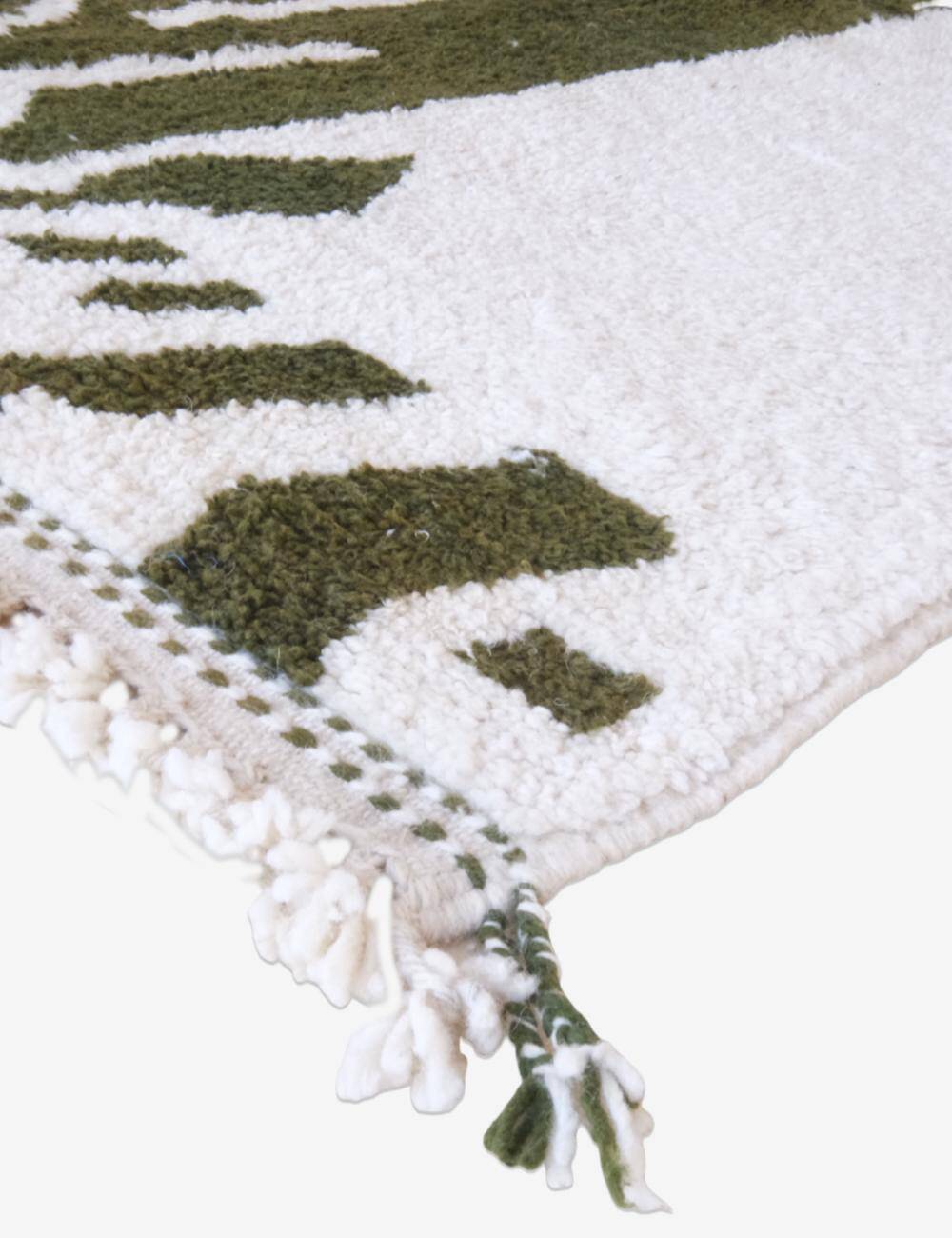 Tapis contemporain vert abstrait