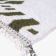 Tapis contemporain vert abstrait