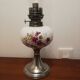 Porcelain and tin oil lamp from the commandery