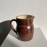 Pitcher in dark brown sandstone glazed with dotted frieze patterns