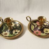 Set of 2 round golden metal candle holders and floral patterns