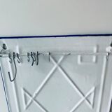 Old enamelled kitchen utensil display