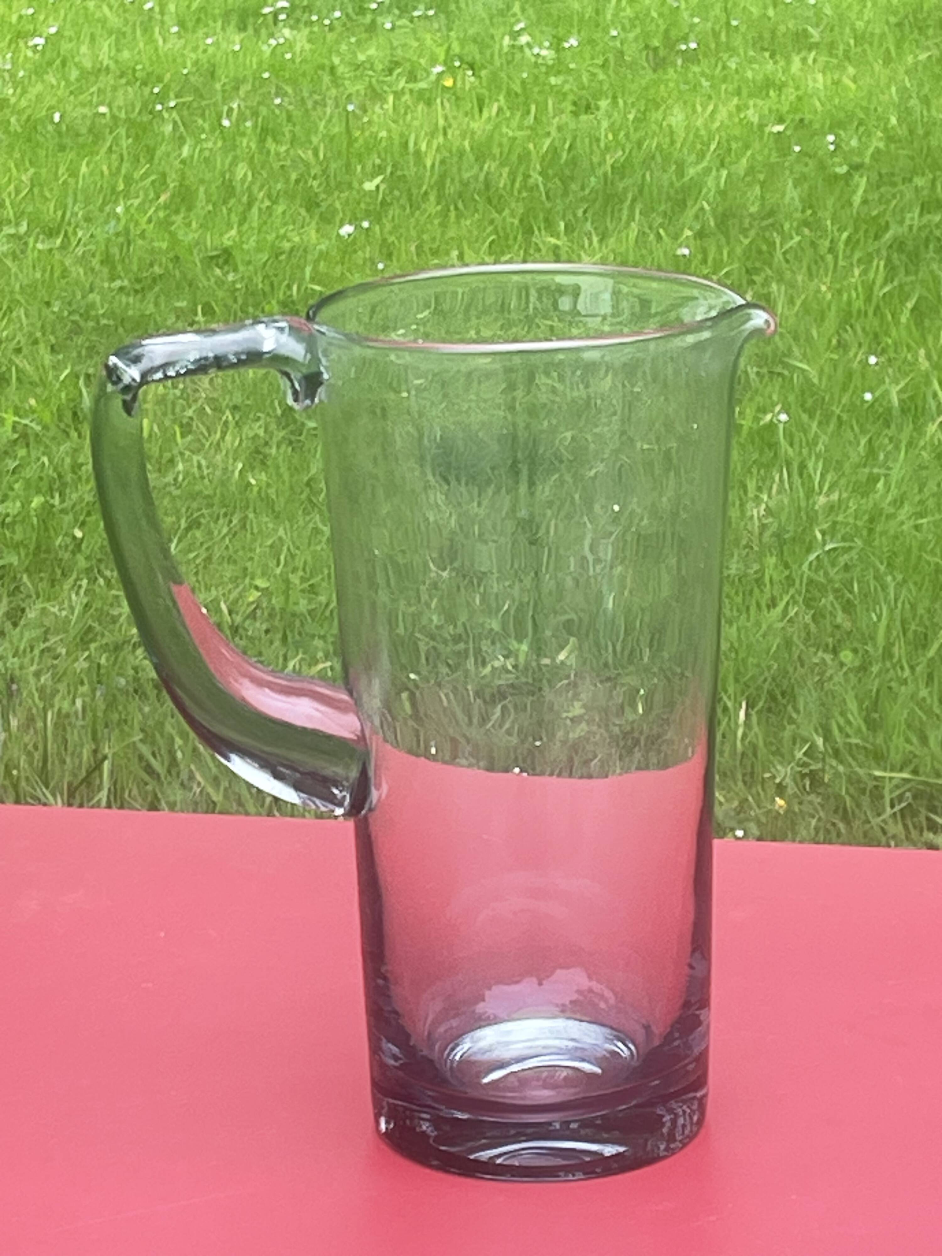elegant water or orangeade pitcher in smoked glass from the 1970s - 25 cm