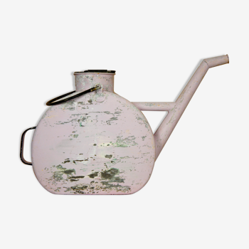 Patinated painted metal watering can with lid