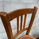 Two vintage curved wooden bistro chairs